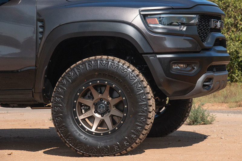 ICON Rebound 18x9 6x5.5 0mm Offset 5in BS 106.1mm Bore Bronze Wheel on offroad truck