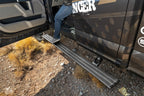 AMP Research 15-20 Chevy/GMC Silverado 2500-3500/Sierra 2500-3500/Crew & Double Cab PowerStep in use on an off road vehicle