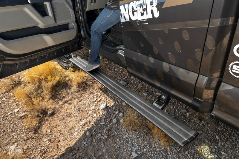AMP Research 15-20 Chevy/GMC Silverado 2500-3500/Sierra 2500-3500/Crew & Double Cab PowerStep in use on an off road vehicle