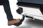AMP Research 19-22 Chevrolet/GMC Silverado/Sierra 1500 BedStep - Black being used with foot on bumper step.