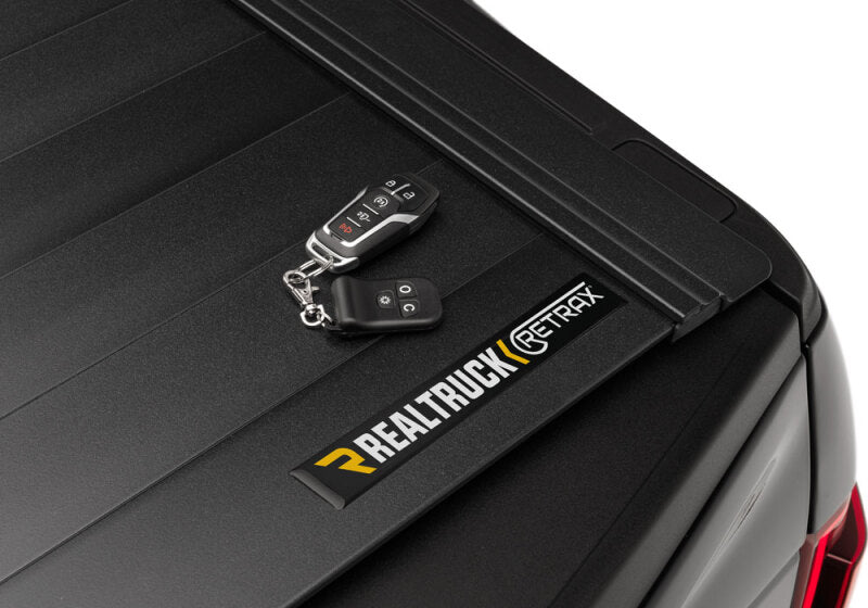 Retrax 09-up Ram 1500 6.5ft Bed / 10-up Short Bed PowertraxPRO MX with remote keys on matte black cover