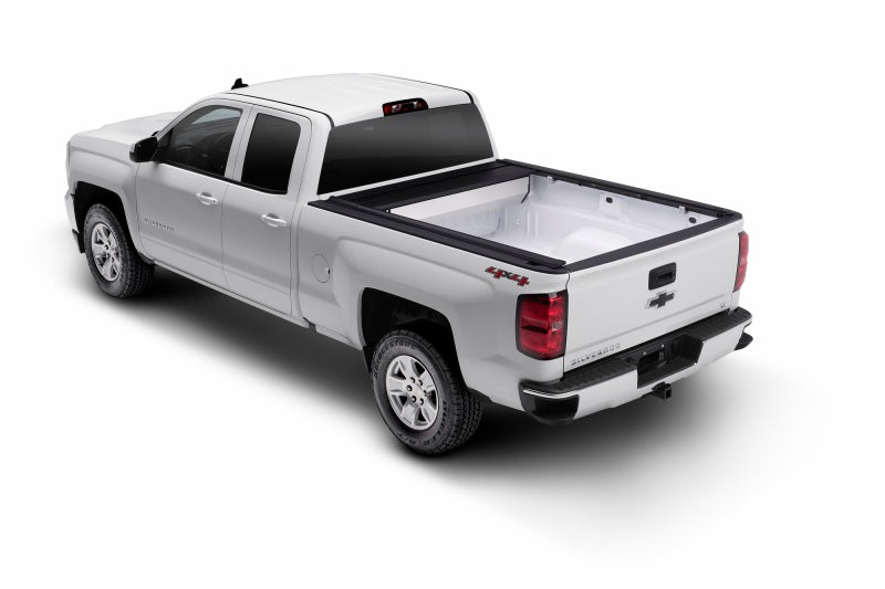 Retrax 15-22 Ford F-150 Super Crew/Super Cab/Reg Cab (6.5ft. Bed) Retrax IX on white truck with open bed.