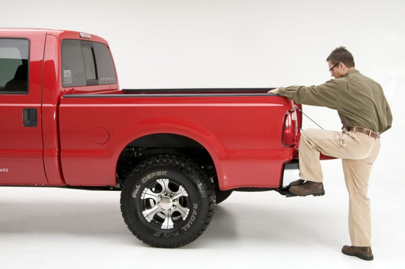 AMP Research 1999-2016 Ford F-250/350/450 BedStep - Black in use