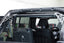 DV8 Offroad 18-23 Jeep Wrangler JL 4-Door Speaker/Light Bar Mount installed in vehicle.