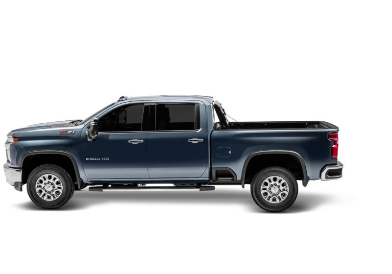 BAK 2020 Chevy Silverado 2500/3500 HD 8ft Bed BAKFlip G2 side view with offroad wheels and exterior accessories for trucks