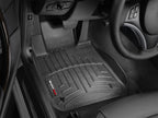 WeatherTech 08+ BMW 1-Series (E82/E88) Front FloorLiner - Black installed in vehicle interior.