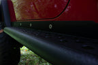 Fishbone Offroad 97-06 Jeep Wrangler TJ Steel Rock Slider - Black Textured Powdercoat close-up view