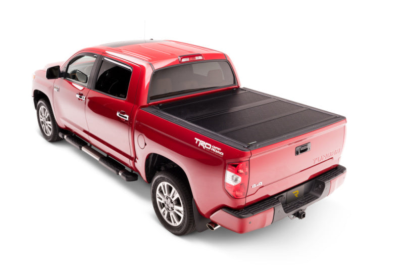 BAK 2022+ Toyota Tundra 5.5ft Bed BAKFlip G2 Bed Cover on red truck