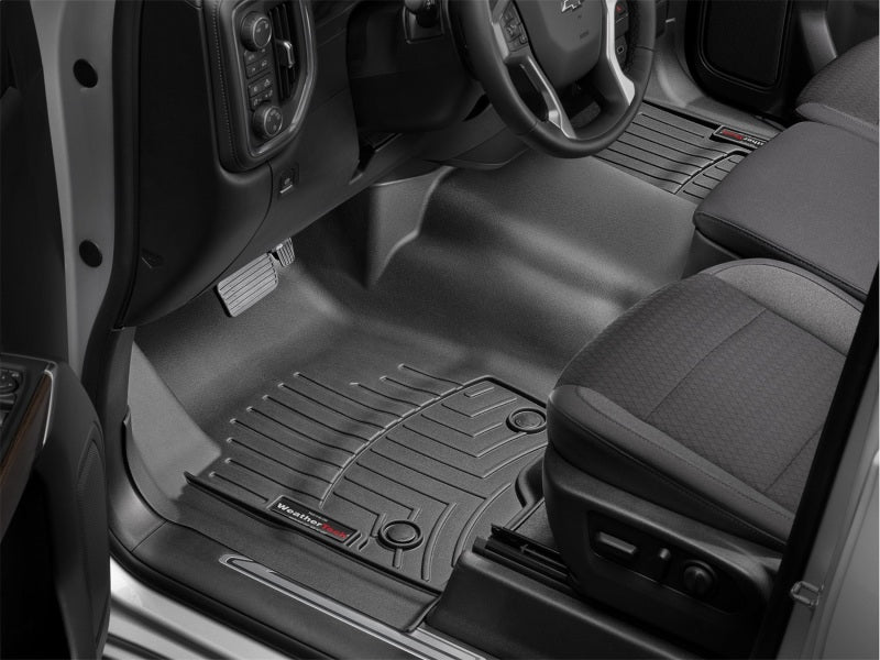 WeatherTech 2019+ Chevrolet Silverado 1500 Front FloorLiner - Black in vehicle interior with high-quality material.