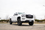 Cognito 07-20 Chev Silv/Sierra 1500 Yukon/Tahoe/Sub 2WD/4WD 3in Perf Leveling Kit w/ Fox 2.0 IFP mounted on a GMC truck.