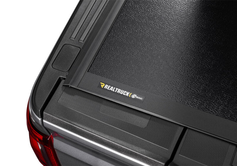 BAK 2021+ Ford F-150 Regular Super Cab & Super Crew (4 Door) BAKFlip G2 6.5ft Bed Cover with durable finish and logo.