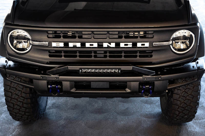 DV8 Offroad 21-22 Ford Bronco Factory Modular Front Bumper Bull Bar with low profile design and LED light bar.