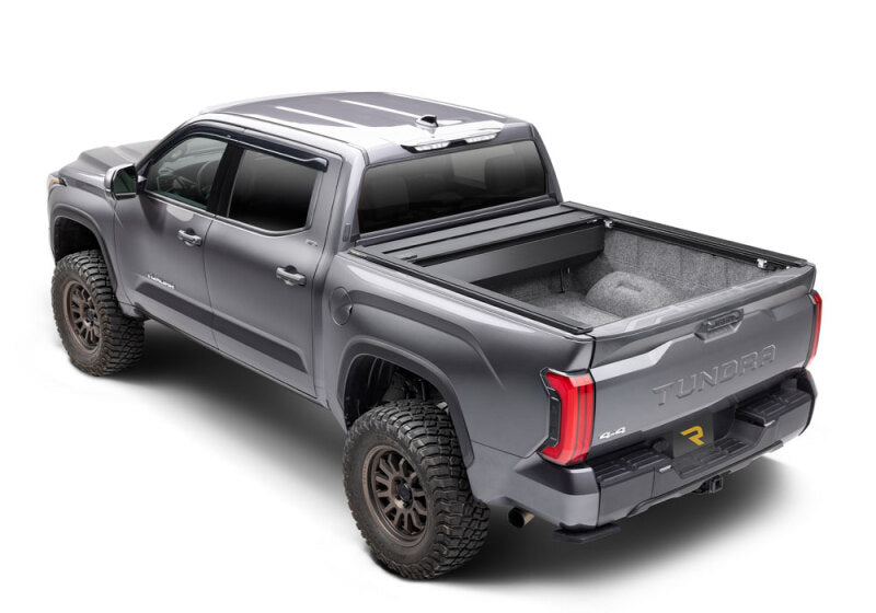 Retrax 2007-2020 Toyota Tundra CrewMax 5.5ft Bed RetraxPRO XR with Deck Rail System on offroad truck