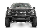 Addictive Desert Designs17-20 Ford F-150 Raptor Phantom Front Bumper with offroad tires and skid plates for trucks.