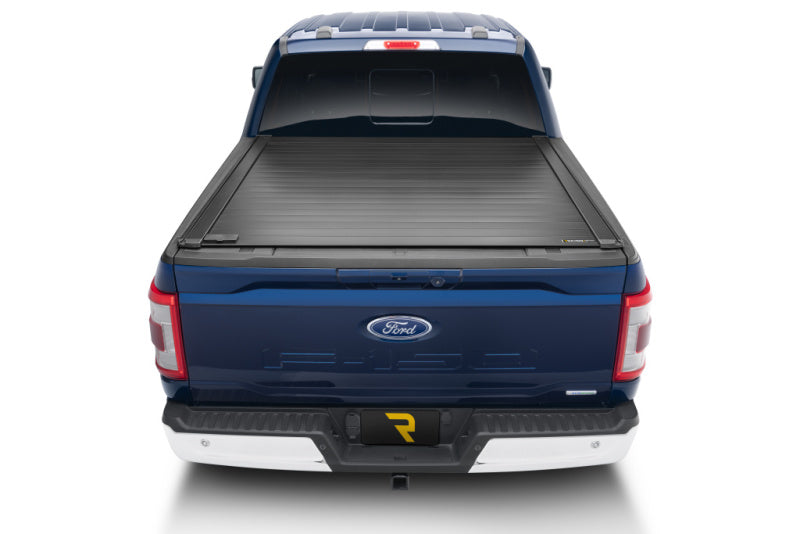 Retrax 21-22 Ford F-150 Super Crew/Super Cab (Incl. 2022 Lightning) 5.5ft Bed RetraxPRO XR installed on a blue truck.