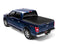 BAK 21-22 Ford F-150 (Incl. 2022 Lightning) BAKFlip FiberMax 5.7ft Bed Cover on blue truck