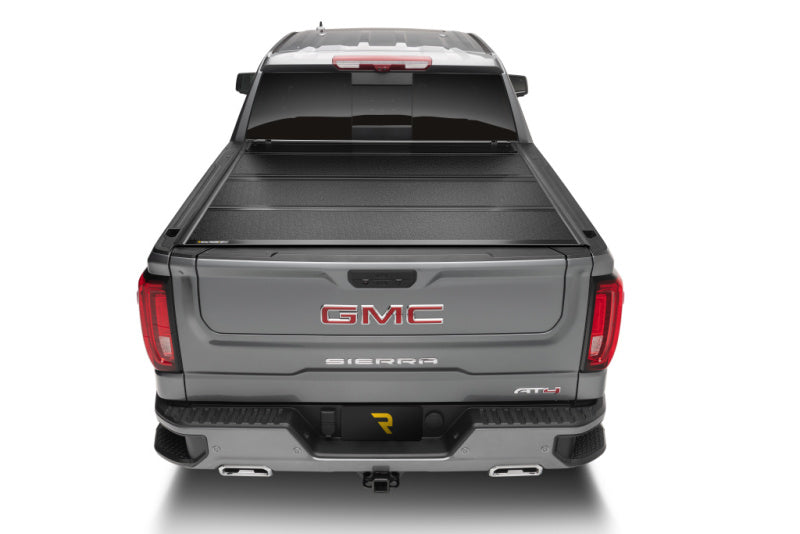 BAK 2020 Chevy Silverado 2500/3500 HD 6ft 9in Bed BAKFlip F1 installed on GMC Sierra truck bed with hard cover.