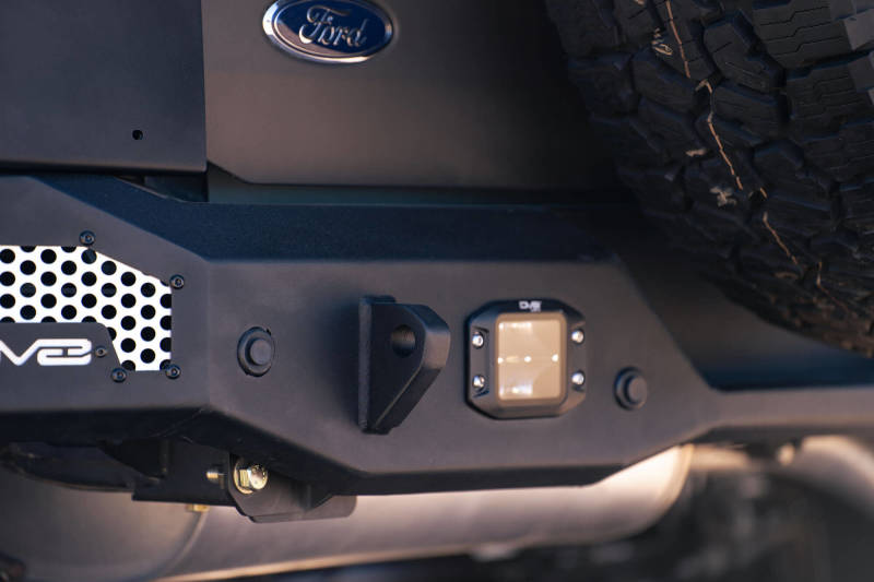DV8 Offroad 21-22 Ford Bronco MTO Series Rear Bumper detail with flush mount lights and Ford logo.
