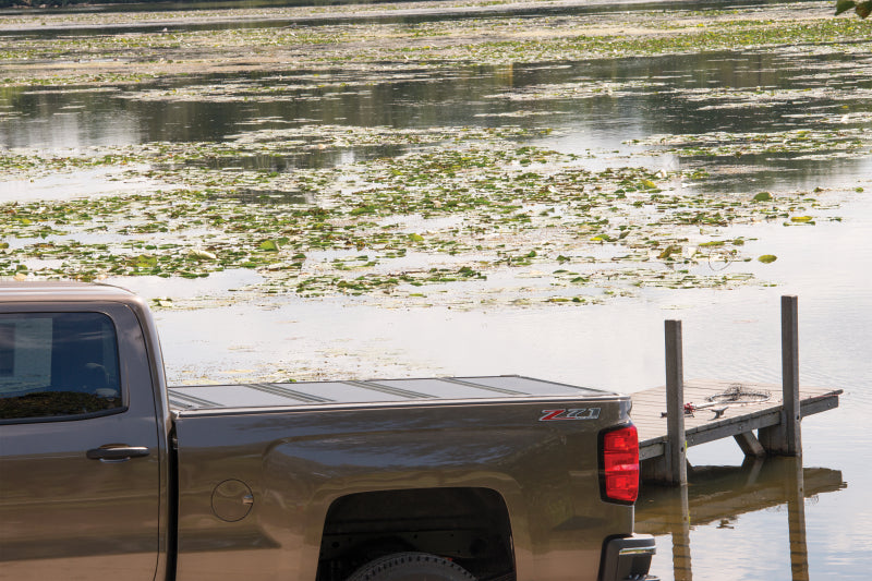 BAK 2024 Toyota Tacoma 5ft Bed BAKFlip Fibermax Bed Cover with lake view