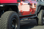DV8 Offroad 20-23 Jeep Gladiator JT Rock Skins on red Jeep Gladiator with offroad tires.