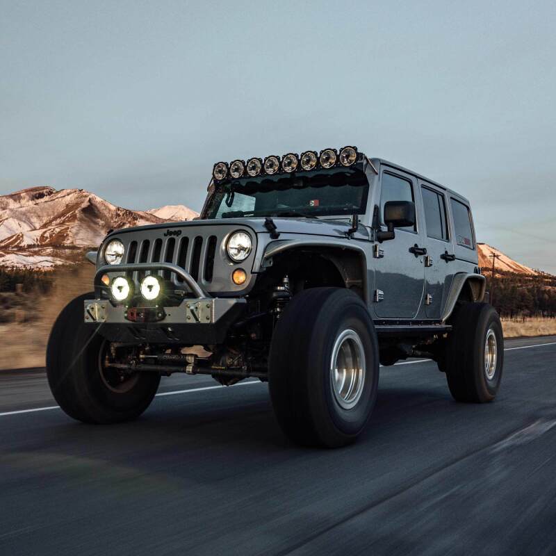 KC HiLiTES Gravity Titan LED 6in. - Pair Pack (SAE Driving Beam) on modified Jeep driving off-road.