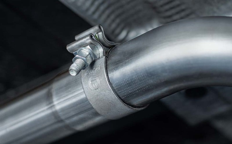 MagnaFlow D-Fit Muffler 409 SS 3.5in 14-19 Ram 2500/3500 6.4L exhaust clamp and pipe detail.