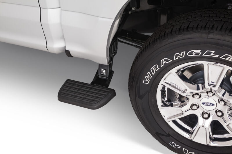 AMP Research 15-22 Ford F150 All Beds BedStep2 - Black side step with truck wheel.