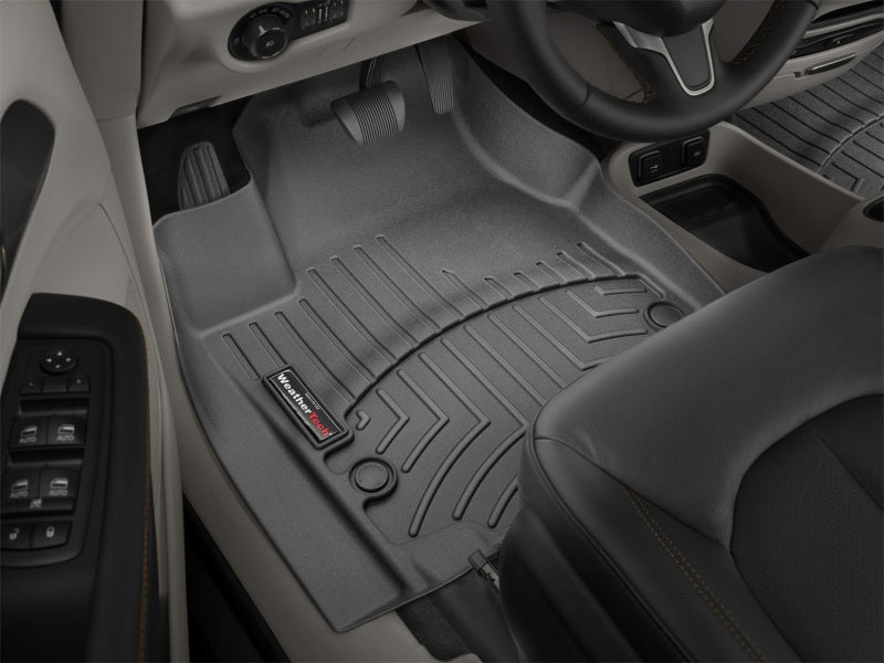WeatherTech 2017+ Chrysler Pacifica Front FloorLiner - Black installed in vehicle interior, providing superior protection.