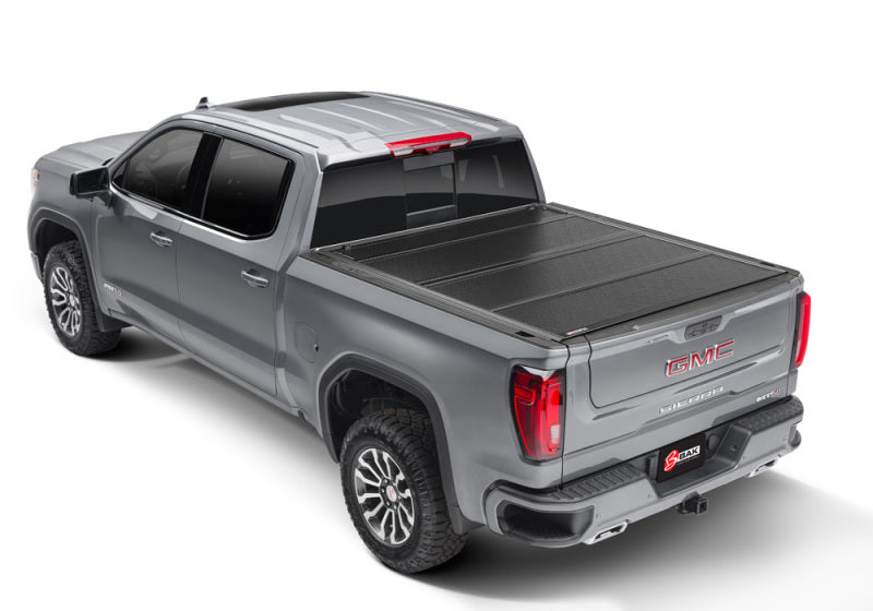 BAK 19-20 Chevy Silverado 5ft 8in Bed (New Body Style) BAKFlip F1 hard folding truck bed cover on GMC truck.