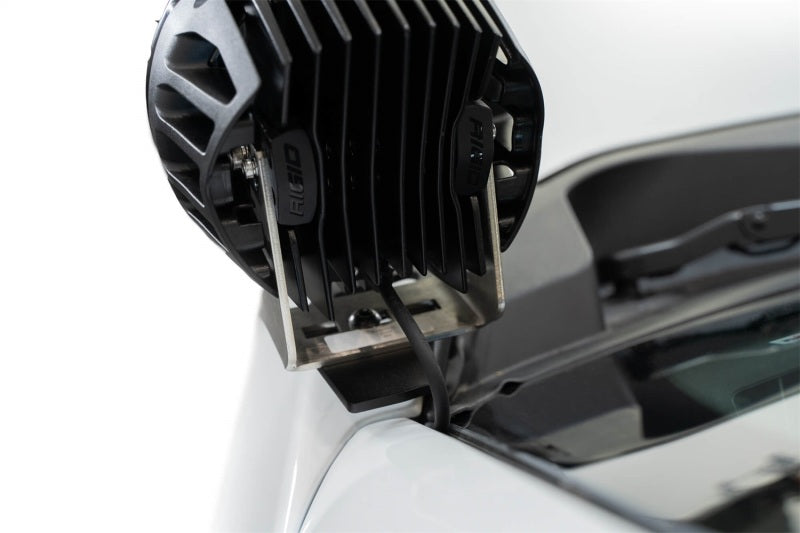 Addictive Desert Designs2023+ Ford Super Duty F250/350 Ditch Light Brackets with Rigid cube light for offroad lighting.