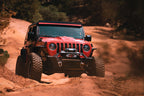 DV8 Offroad 2018+ Jeep Wrangler JL/Gladiator LED Projector Headlights in action on rough terrain