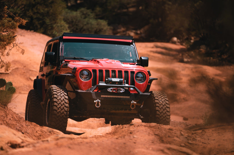 DV8 Offroad 2018+ Jeep Wrangler JL/Gladiator LED Projector Headlights in action on rough terrain