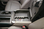 Tuffy Console Safe W/ Combo Lock For Ford Fseries Flow Thru Console inside vehicle showing storage compartment.