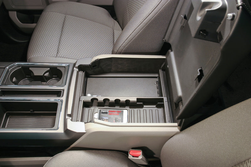 Tuffy Console Safe W/ Combo Lock For Ford Fseries Flow Thru Console inside vehicle showing storage compartment.