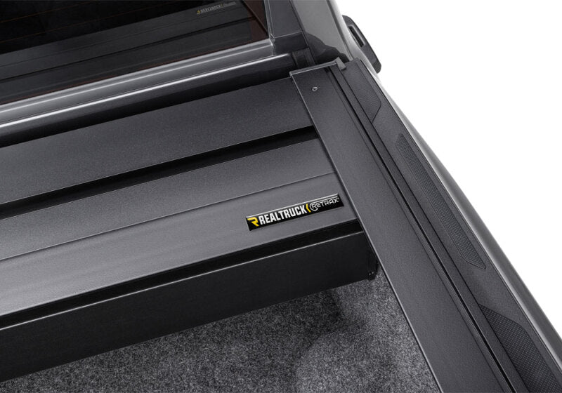 Retrax 2007-2020 Toyota Tundra CrewMax 5.5ft Bed RetraxPRO XR with Deck Rail System close-up view
