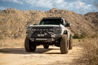 DV8 Offroad 2021 Ford Bronco A Pillar Dual Light Pod Drop Mounts on rugged terrain
