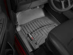 WeatherTech 12+ Dodge Ram 1500 Front FloorLiner - Black in truck interior
