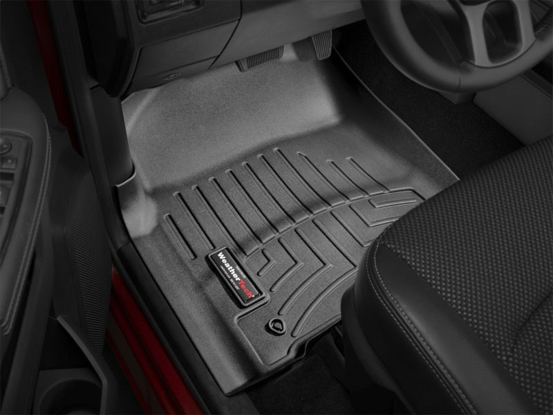 WeatherTech 12+ Dodge Ram 1500 Front FloorLiner - Black in truck interior
