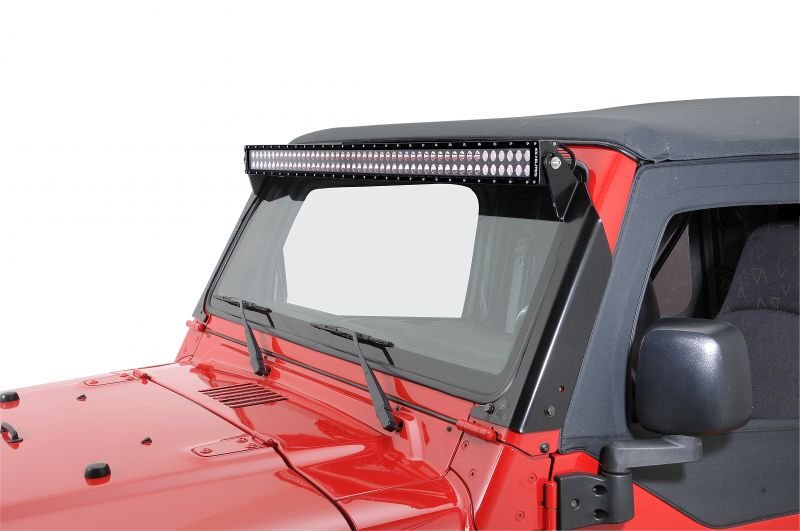 KC HiLiTES 97-06 Jeep TJ Overhead Mount Bracket Set for 50in. C-Series/Gravity Pro6 LED Light Bars mounted on a Jeep.