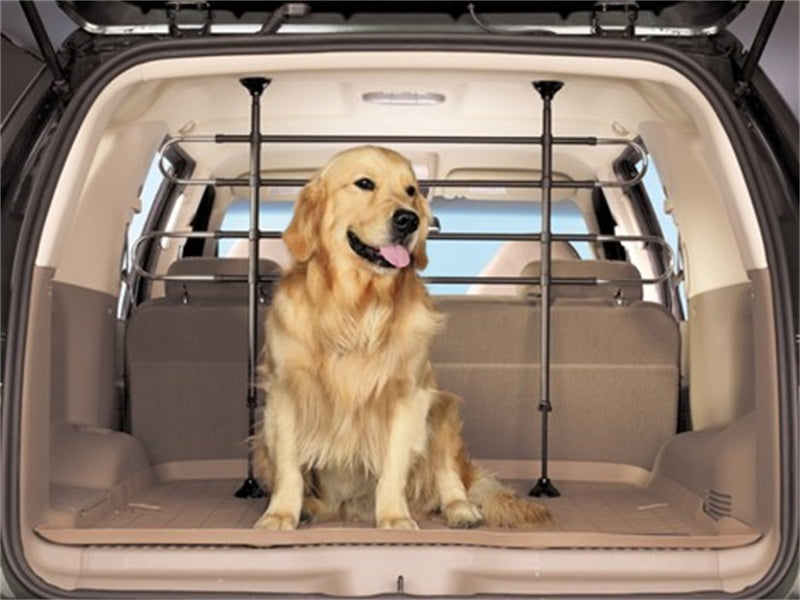 WeatherTech Universal Pet Barrier with dog in vehicle trunk