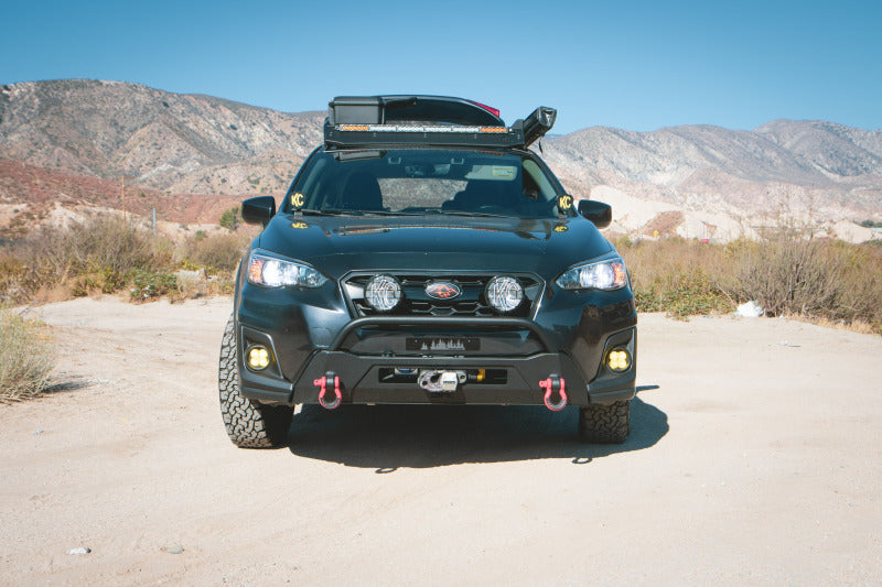 Body Armor 4x4 18-21 Subaru Crosstrek HiLine Front Winch Bumper on rugged terrain
