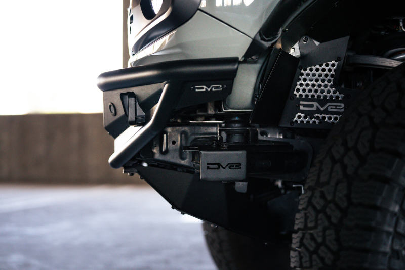 DV8 Offroad 21-22 Ford Bronco Competition Series Front Bumper close-up view with high-quality steel components and skid plate.