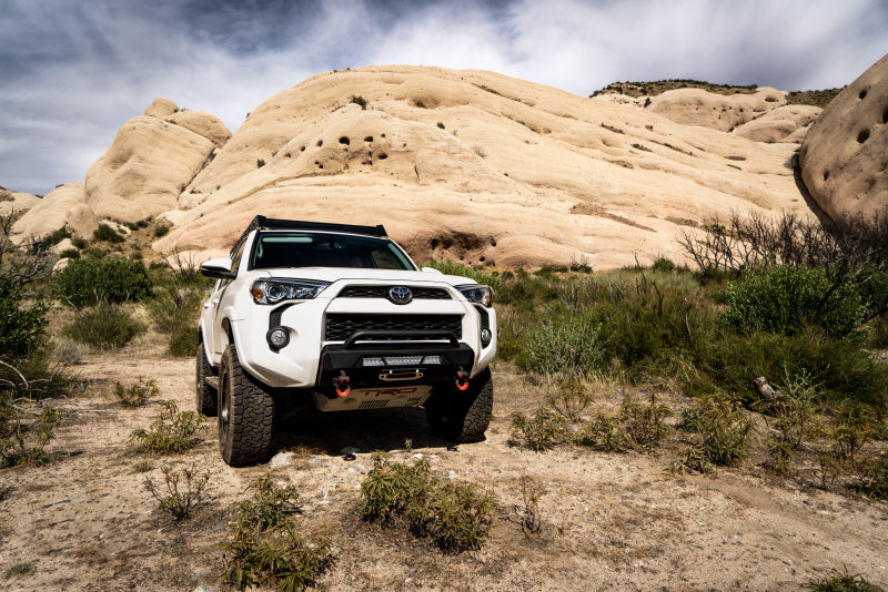 Body Armor 4x4 2014+ Toyota 4Runner HiLine Front Winch Bumper on off-road terrain