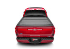 BAK 21-22 Ford F-150 (Incl. 2022 Lightning) BAKFlip MX4 5.7ft Bed Cover - Matte Finish on red truck