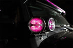 Rigid Industries 360-Series 4in LED Off-Road Drive Beam - RGBW (Pair) on a truck with pink backlighting