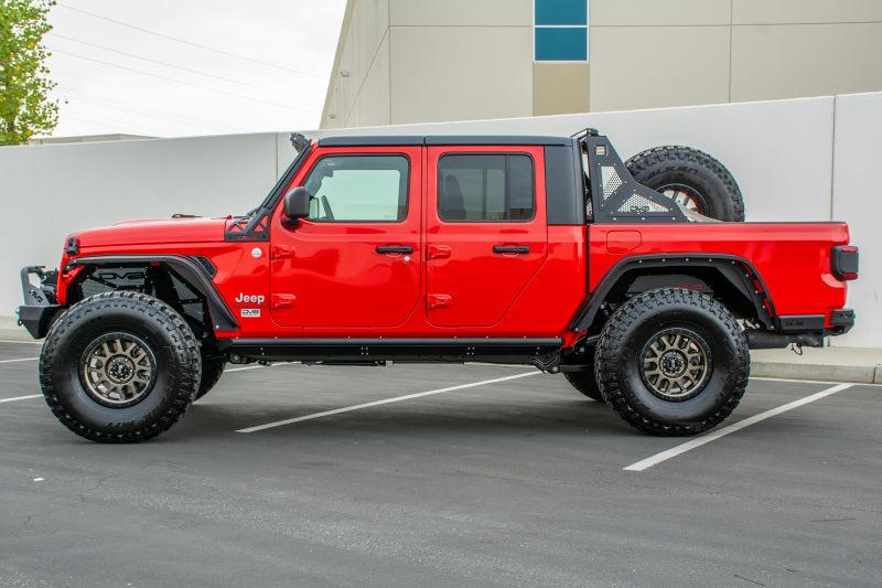 DV8 Offroad 2019+ Jeep Gladiator Side Step/Sliders on red truck
