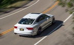 MagnaFlow SYS Cat-Back 2015 Audi A3 Quattro 2.0L T cruising on a winding road