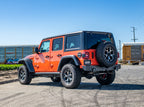 Borla 18-19 Jeep Wrangler JL/JLU 2.0L 4Cyl 2DR/4DR Axle Back Exhaust ATAK w/ 3.5in Tips on a modified orange Jeep