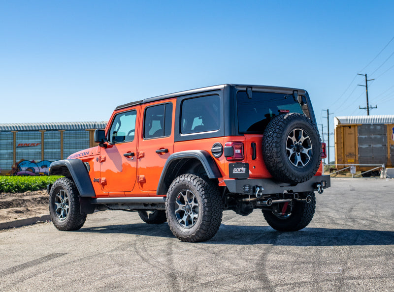 Borla 18-19 Jeep Wrangler JL/JLU 2.0L 4Cyl 2DR/4DR Axle Back Exhaust ATAK w/ 3.5in Tips on a modified orange Jeep