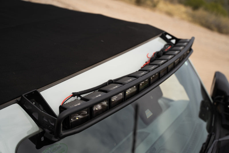 DV8 21+ Ford Bronco Curved Light Bracket for 12 3in. Pod Lights mounted on vehicle roof for offroad lighting.